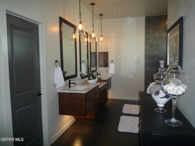 5868 Valley Palm Dr, El Paso, TX 79932 - full bath featuring tile patterned flooring, double vanity, and baseboards
