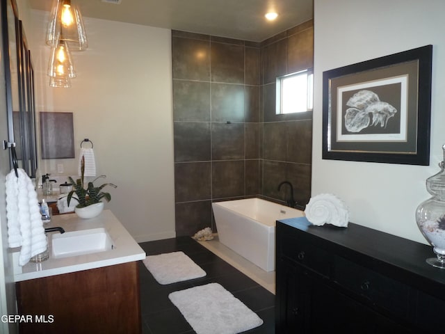 5868 Valley Palm Dr, El Paso, TX 79932 - full bath with a tub to relax in, double vanity, and tile patterned flooring