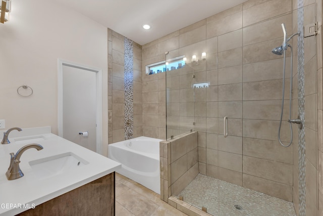 1741 Breeder Cup Way, El Paso, TX 79928 - full bath with a stall shower, a garden tub, double vanity, recessed lighting, and tile patterned floors