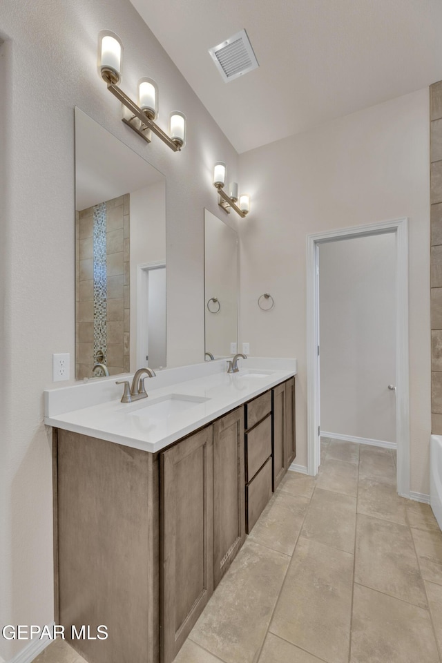 1741 Breeder Cup Way, El Paso, TX 79928 - full bath featuring double vanity, a bathtub, and tile patterned floors
