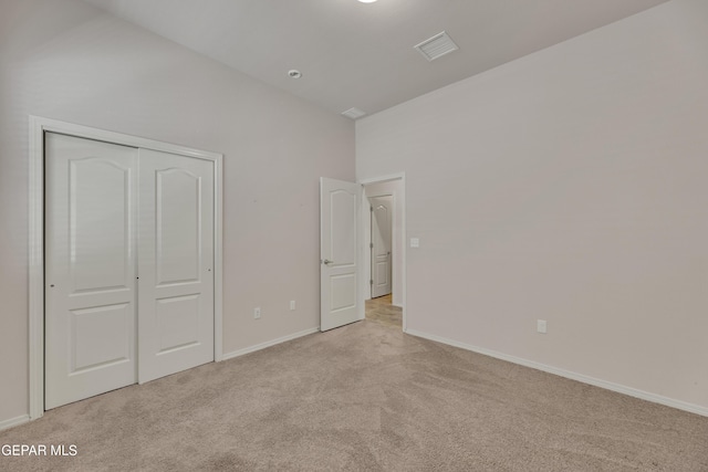 1741 Breeder Cup Way, El Paso, TX 79928 - unfurnished bedroom with light carpet, a closet, and baseboards
