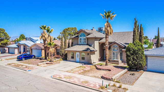 11513 Cree Ct, El Paso, TX 79936 - traditional-style house featuring concrete driveway, a residential view, and a shingled roof