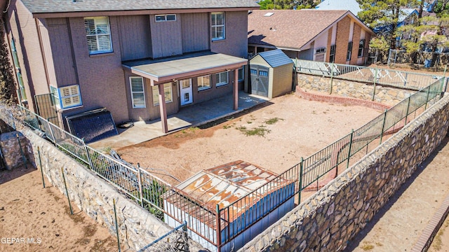 11513 Cree Ct, El Paso, TX 79936 - back of house with a patio area, a fenced backyard, and a shingled roof
