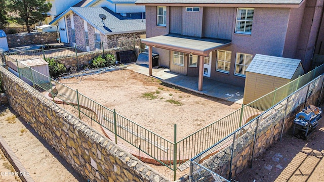 11513 Cree Ct, El Paso, TX 79936 - rear view of property featuring a patio area, a fenced backyard, and a shingled roof