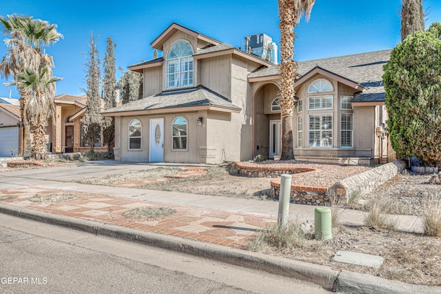 11513 Cree Ct, El Paso, TX 79936 - view of front of house featuring brick siding and a shingled roof
