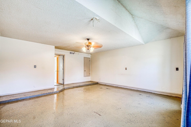 11513 Cree Ct, El Paso, TX 79936 - spare room with speckled floor, a ceiling fan, a textured ceiling, and baseboards