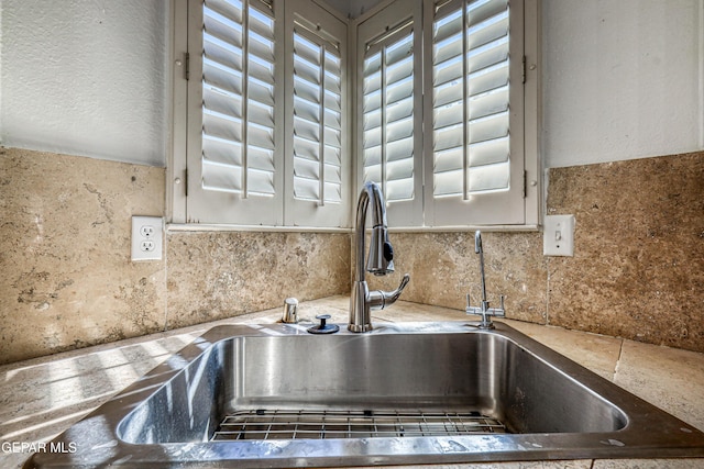 11513 Cree Ct, El Paso, TX 79936 - kitchen view of a sink and backsplash