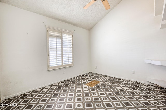 11513 Cree Ct, El Paso, TX 79936 - spare room with a textured ceiling, vaulted ceiling, and ceiling fan