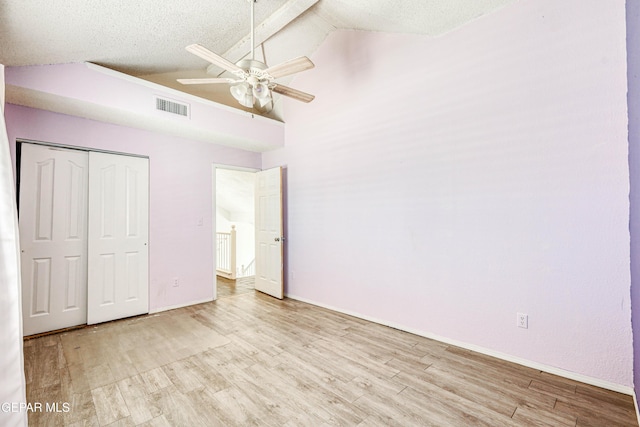 11513 Cree Ct, El Paso, TX 79936 - unfurnished bedroom with wood finished floors, a textured ceiling, a closet, baseboards, and a ceiling fan