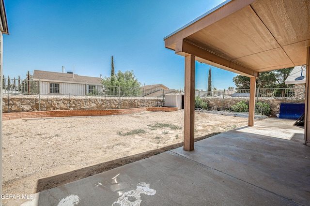 11513 Cree Ct, El Paso, TX 79936 - fenced backyard with a patio