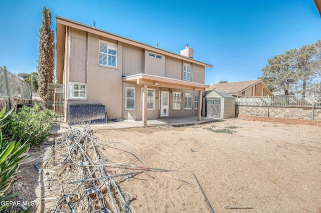 11513 Cree Ct, El Paso, TX 79936 - rear view of house featuring a patio, a chimney, a fenced backyard, and brick siding