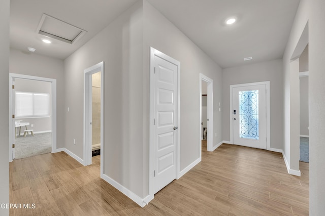 13676 Lago Vista Ave, Horizon City, TX 79928 - entryway featuring light wood-style floors, baseboards, and recessed lighting