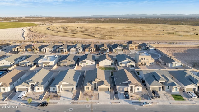 13676 Lago Vista Ave, Horizon City, TX 79928 - aerial view of property and surrounding area featuring nearby suburban area and a mountainous background