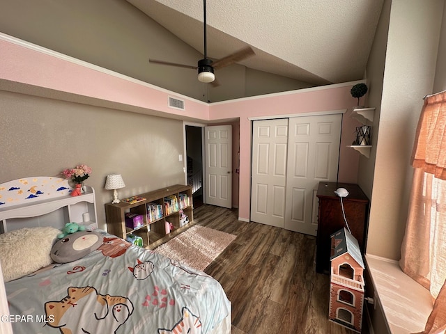 11048 Nathan Bay Dr, El Paso, TX 79934 - bedroom featuring wood finished floors, a closet, a textured ceiling, a ceiling fan, and high vaulted ceiling