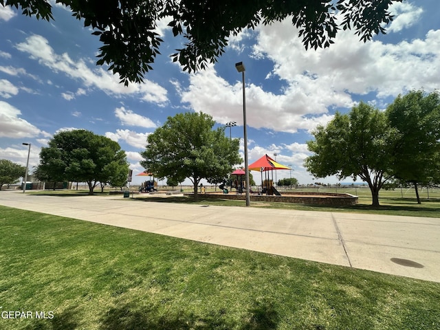 11048 Nathan Bay Dr, El Paso, TX 79934 - surrounding community with a yard