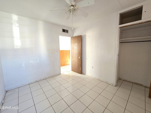 371 Medina St, El Paso, TX 79905 - unfurnished bedroom with a closet, ceiling fan, and light tile patterned floors