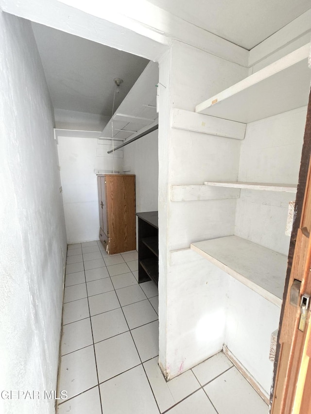 371 Medina St, El Paso, TX 79905 - spacious closet featuring light tile patterned floors