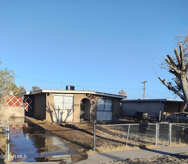 338 Maricela Dr, El Paso, TX 79915 - view of front of home with a fenced front yard and brick siding