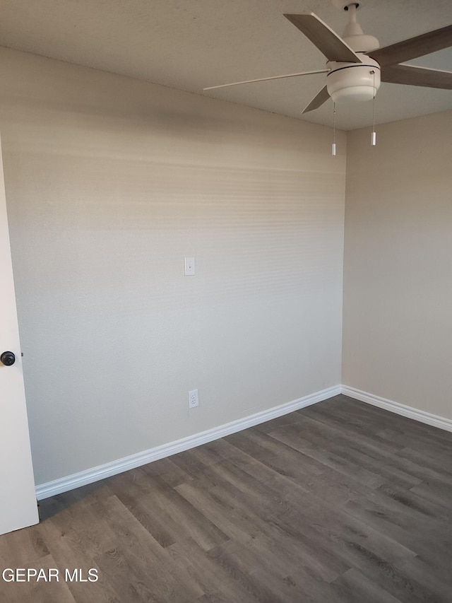 338 Maricela Dr, El Paso, TX 79915 - unfurnished room with dark wood-type flooring, baseboards, and a ceiling fan