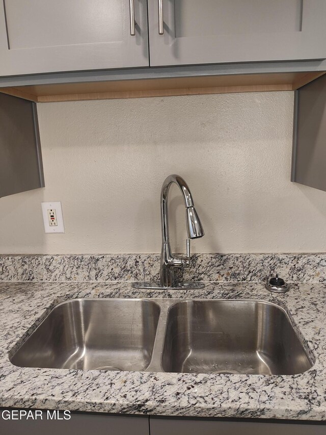 338 Maricela Dr, El Paso, TX 79915 - kitchen view of a sink and light stone countertops