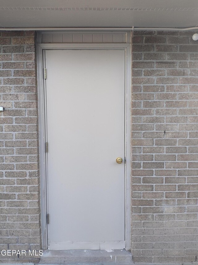 338 Maricela Dr, El Paso, TX 79915 - entrance to property featuring brick siding