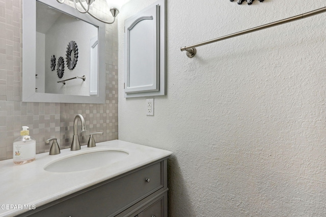 14025 Stoutland Ln, El Paso, TX 79928 - bathroom featuring tasteful backsplash and vanity