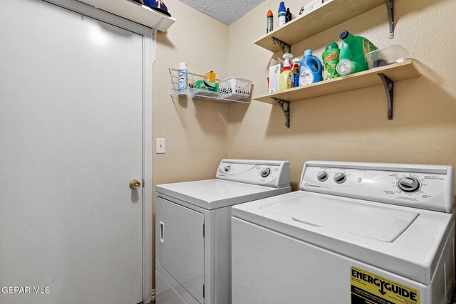14025 Stoutland Ln, El Paso, TX 79928 - washroom featuring separate washer and dryer and a textured ceiling