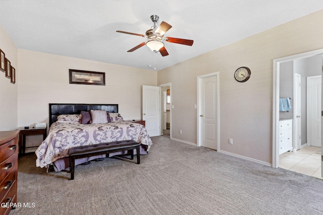 14025 Stoutland Ln, El Paso, TX 79928 - bedroom with light colored carpet, baseboards, a ceiling fan, and ensuite bath