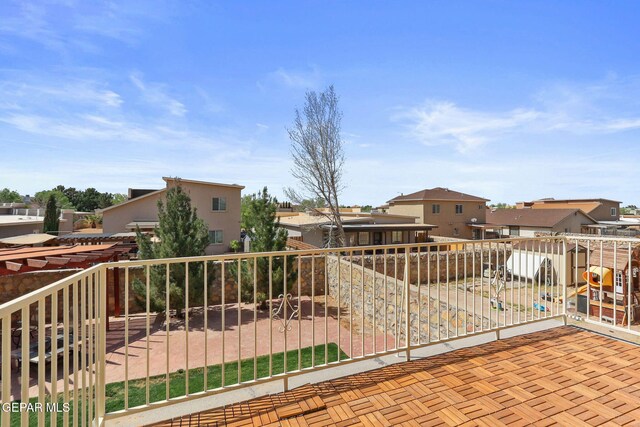 14025 Stoutland Ln, El Paso, TX 79928 - view of patio with a balcony and a residential view
