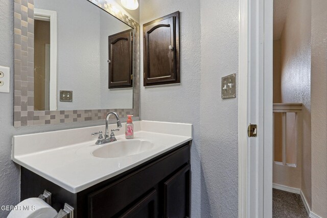 14025 Stoutland Ln, El Paso, TX 79928 - bathroom with vanity, a textured wall, and toilet