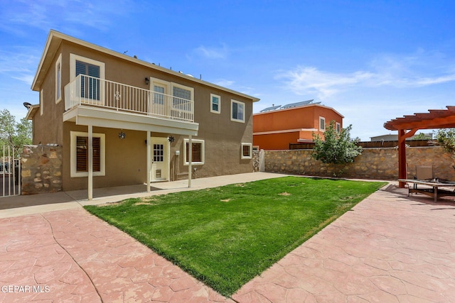 14025 Stoutland Ln, El Paso, TX 79928 - rear view of property with a balcony, a patio, stucco siding, and a pergola
