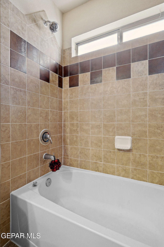 14309 Coyote Trl, El Paso, TX 79938 - full bathroom featuring washtub / shower combination