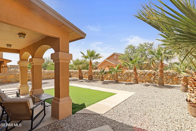 14309 Coyote Trl, El Paso, TX 79938 - fenced backyard with a patio