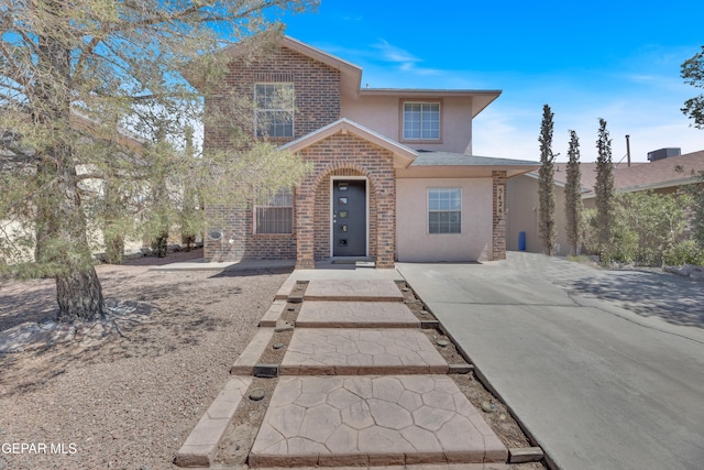 5424 Fire Ridge Cir, El Paso, TX 79932 - traditional-style house featuring brick siding and stucco siding