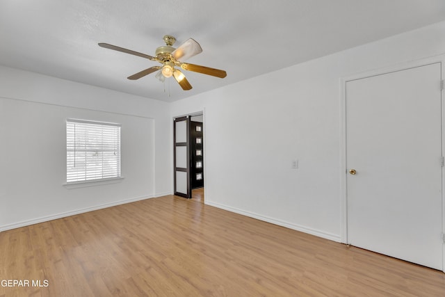 5424 Fire Ridge Cir, El Paso, TX 79932 - unfurnished room featuring light wood-style flooring, ceiling fan, and baseboards