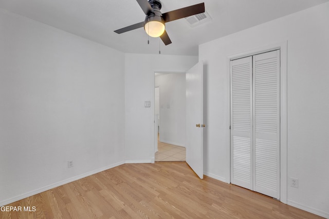 5424 Fire Ridge Cir, El Paso, TX 79932 - unfurnished bedroom featuring light wood-type flooring, a closet, baseboards, and a ceiling fan