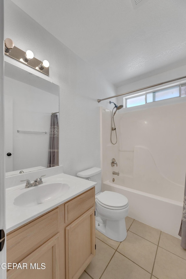 5424 Fire Ridge Cir, El Paso, TX 79932 - full bath featuring vanity, shower / tub combo with curtain, toilet, and tile patterned floors