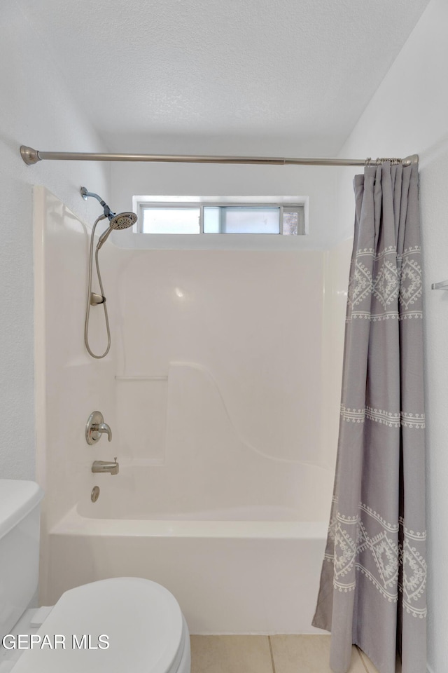 5424 Fire Ridge Cir, El Paso, TX 79932 - full bath featuring toilet, shower / bath combo, tile patterned flooring, and healthy amount of natural light