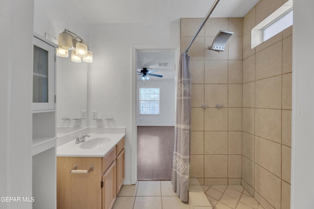 5424 Fire Ridge Cir, El Paso, TX 79932 - full bath with vanity, plenty of natural light, tiled shower, and ceiling fan