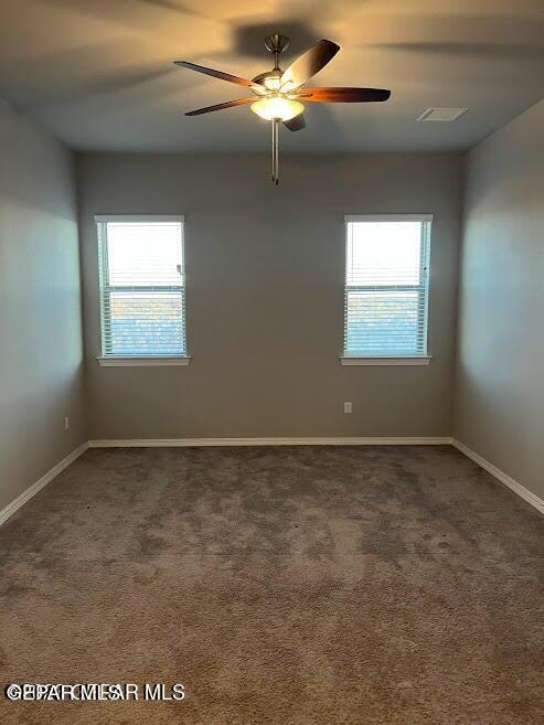 14772 John Mcneely Ave, El Paso, TX 79938 - unfurnished room with ceiling fan, carpet flooring, and baseboards