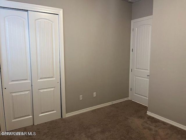 14772 John Mcneely Ave, El Paso, TX 79938 - unfurnished bedroom with carpet flooring, a closet, and baseboards