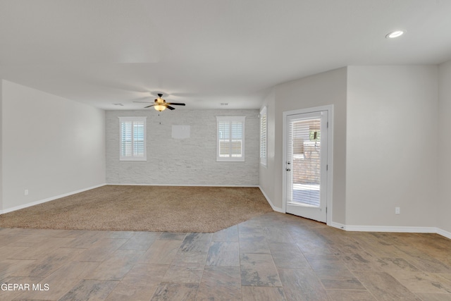 12776 Runway Ave, El Paso, TX 79928 - empty room with a ceiling fan, baseboards, light wood-type flooring, recessed lighting, and light carpet