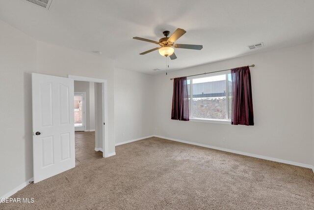 12776 Runway Ave, El Paso, TX 79928 - carpeted spare room featuring a ceiling fan and baseboards