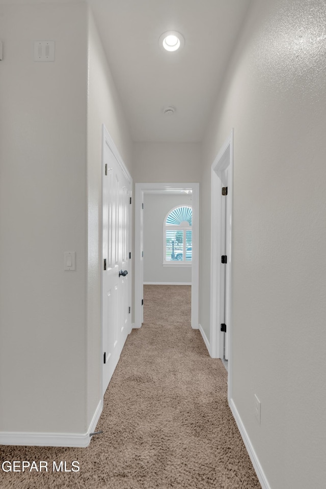 12776 Runway Ave, El Paso, TX 79928 - hall featuring carpet floors and baseboards