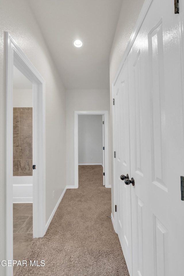 12776 Runway Ave, El Paso, TX 79928 - hall featuring carpet, baseboards, and recessed lighting