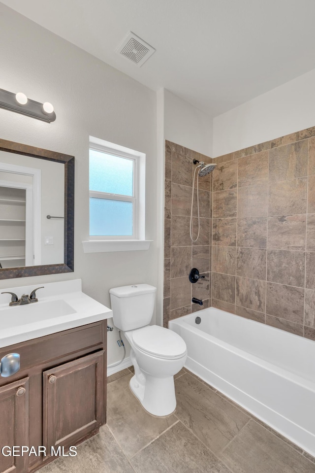 12776 Runway Ave, El Paso, TX 79928 - bathroom with toilet, vanity, bathing tub / shower combination, and tile patterned floors