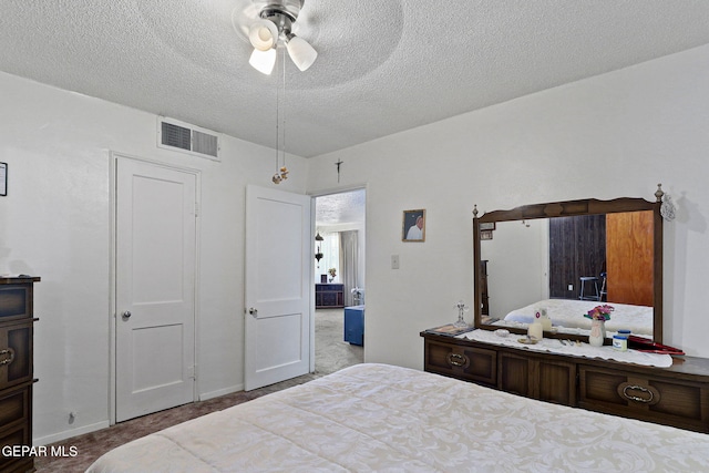 211 Green Haven Pl, El Paso, TX 79907 - bedroom featuring carpet, a textured ceiling, a ceiling fan, and baseboards