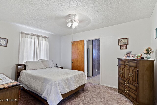 211 Green Haven Pl, El Paso, TX 79907 - bedroom with a textured ceiling, light colored carpet, and ceiling fan