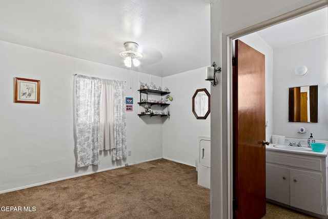 211 Green Haven Pl, El Paso, TX 79907 - bathroom featuring vanity, a ceiling fan, washer / clothes dryer, and baseboards