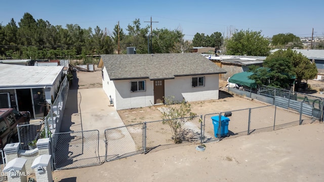 729 Delhi Dr, Socorro, TX 79927 - view of front of property featuring stucco siding and a shingled roof